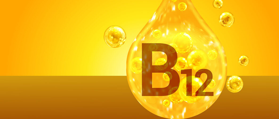 Vitamin B12. Goldene Tropfen mit Sauerstoffblasen