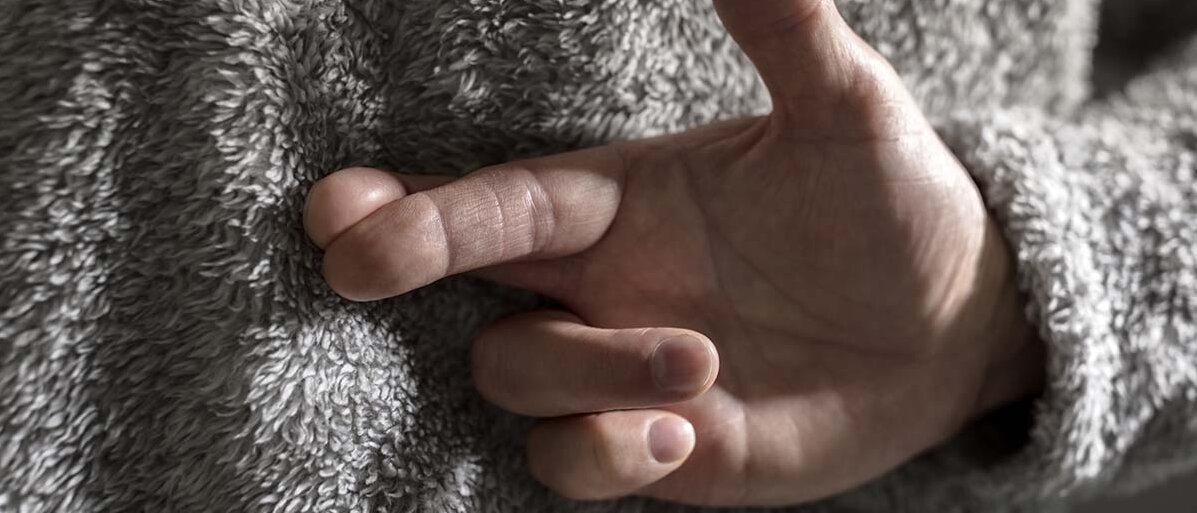 Münchhausen-Syndrom Finger über Kreuz.